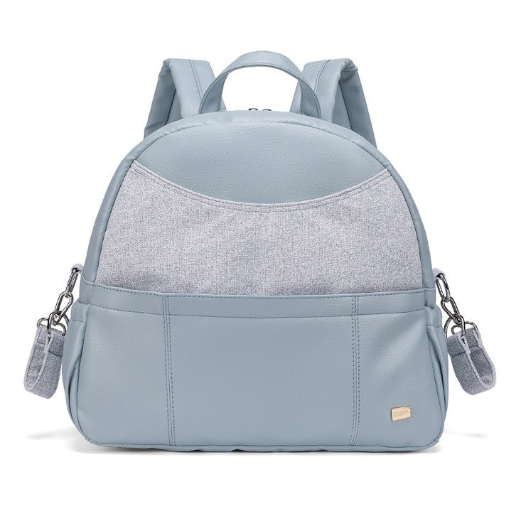 Light blue vegan leather diaper bag backpack with gray fabric accents and multiple compartments
