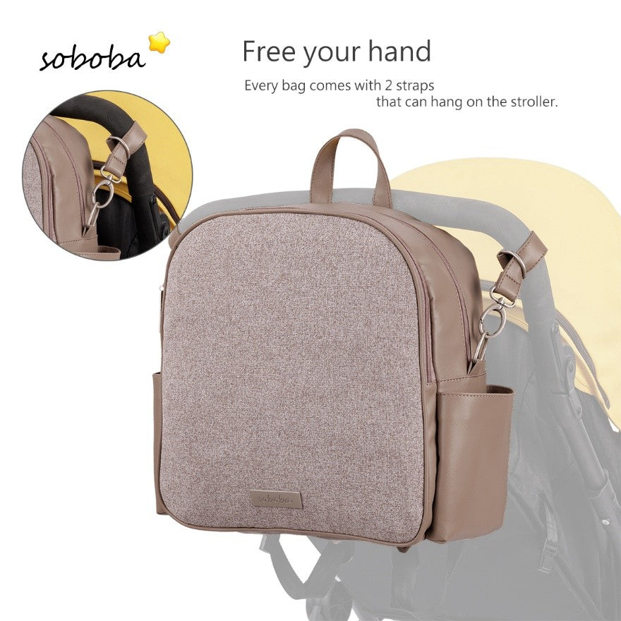 Vegan leather diaper bag backpack in taupe with stroller straps and multiple pockets for organization