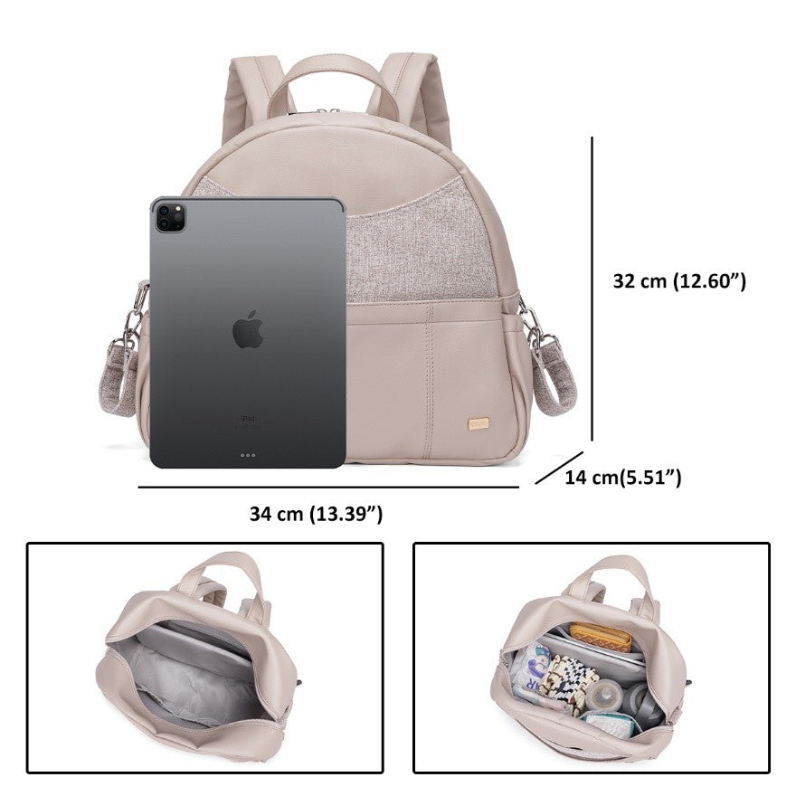 Beige vegan leather diaper bag backpack showing size with iPad and organized interior pockets for baby essentials