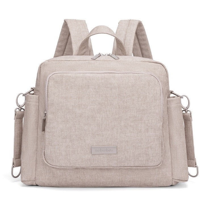 Beige vegan leather diaper bag backpack with multiple compartments and adjustable shoulder straps