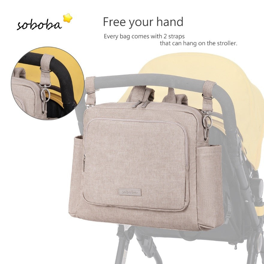 Vegan leather diaper bag backpack in beige with stroller straps and multiple compartments