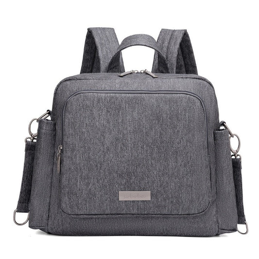 Gray vegan leather diaper bag backpack with multiple compartments and adjustable straps